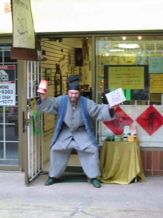 And From No-Where A Polish Freak Dressed Like a Korean Selling Tea to The Chinese!
