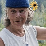 Blue Toque and wild flower